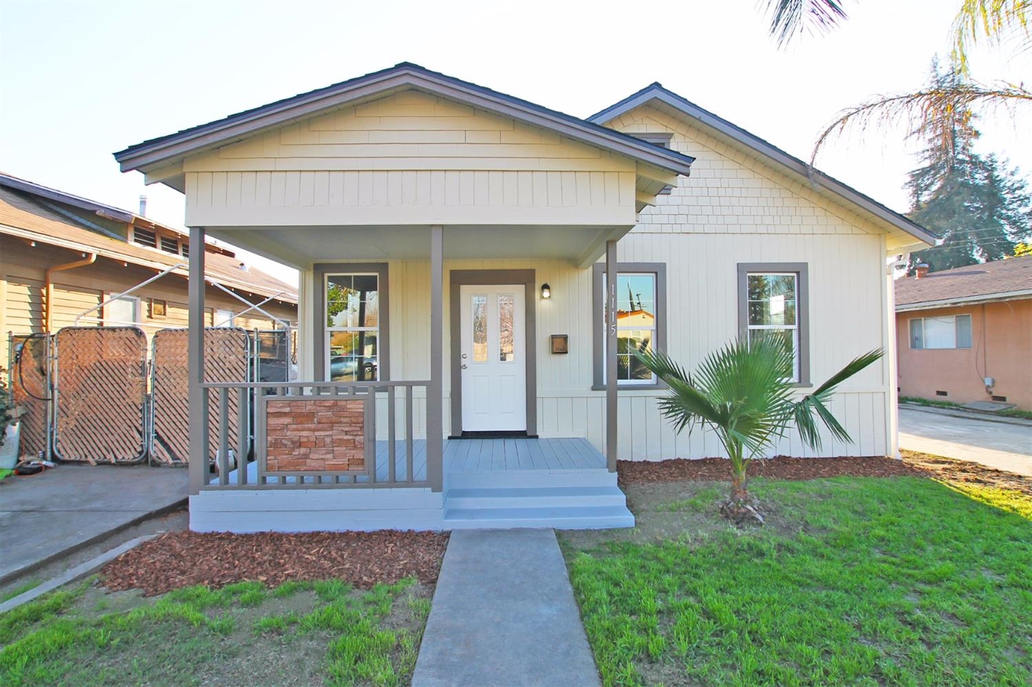 1115 M Street Reedley, CA 93654 - Photo 1 of 10 a view of a house with a yard