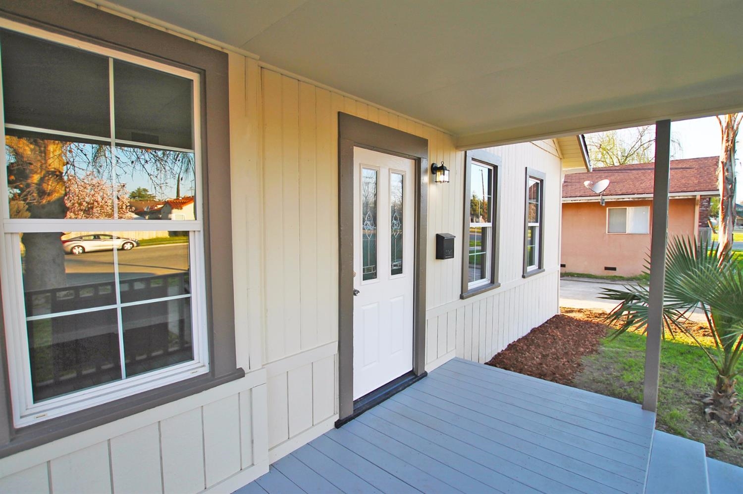 1115 M Street Reedley, CA 93654 - Photo 3 of 10 a view of front door and porch of the house