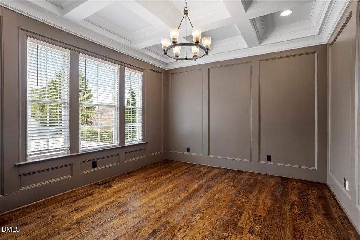 12616 Village Springs Road Raleigh, NC 27614 - Photo 12 of 89 a view of an empty room with a window