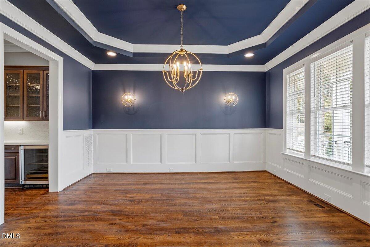 12616 Village Springs Road Raleigh, NC 27614 - Photo 14 of 89 a view of a livingroom with wooden floor