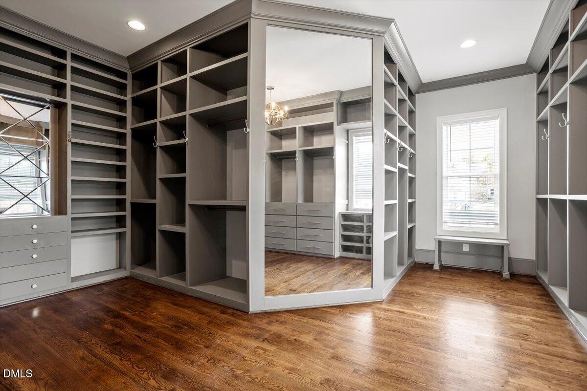 12616 Village Springs Road Raleigh, NC 27614 - Photo 46 of 89 a view of an empty room with wooden floor and a window