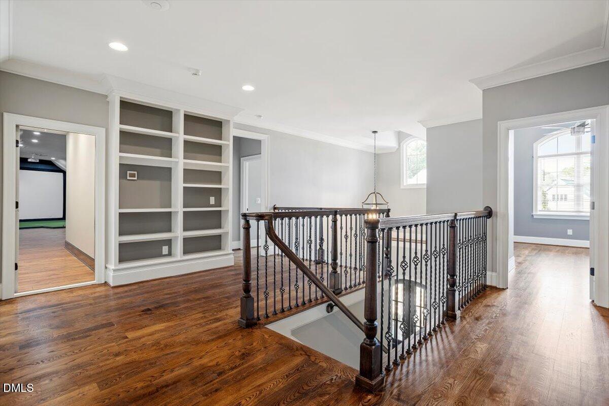 12616 Village Springs Road Raleigh, NC 27614 - Photo 48 of 89 a view of a room with wooden floor and windows