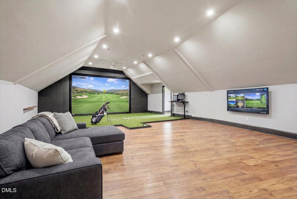 12616 Village Springs Road Raleigh, NC 27614 - Photo 52 of 89 a living room with fireplace furniture and a flat screen tv