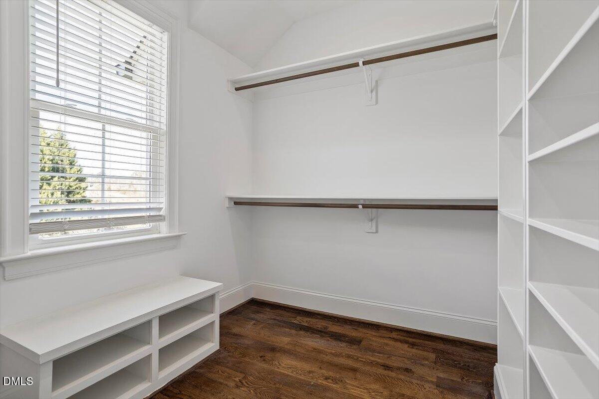 12616 Village Springs Road Raleigh, NC 27614 - Photo 67 of 89 a view of an empty room with wooden floor and a window