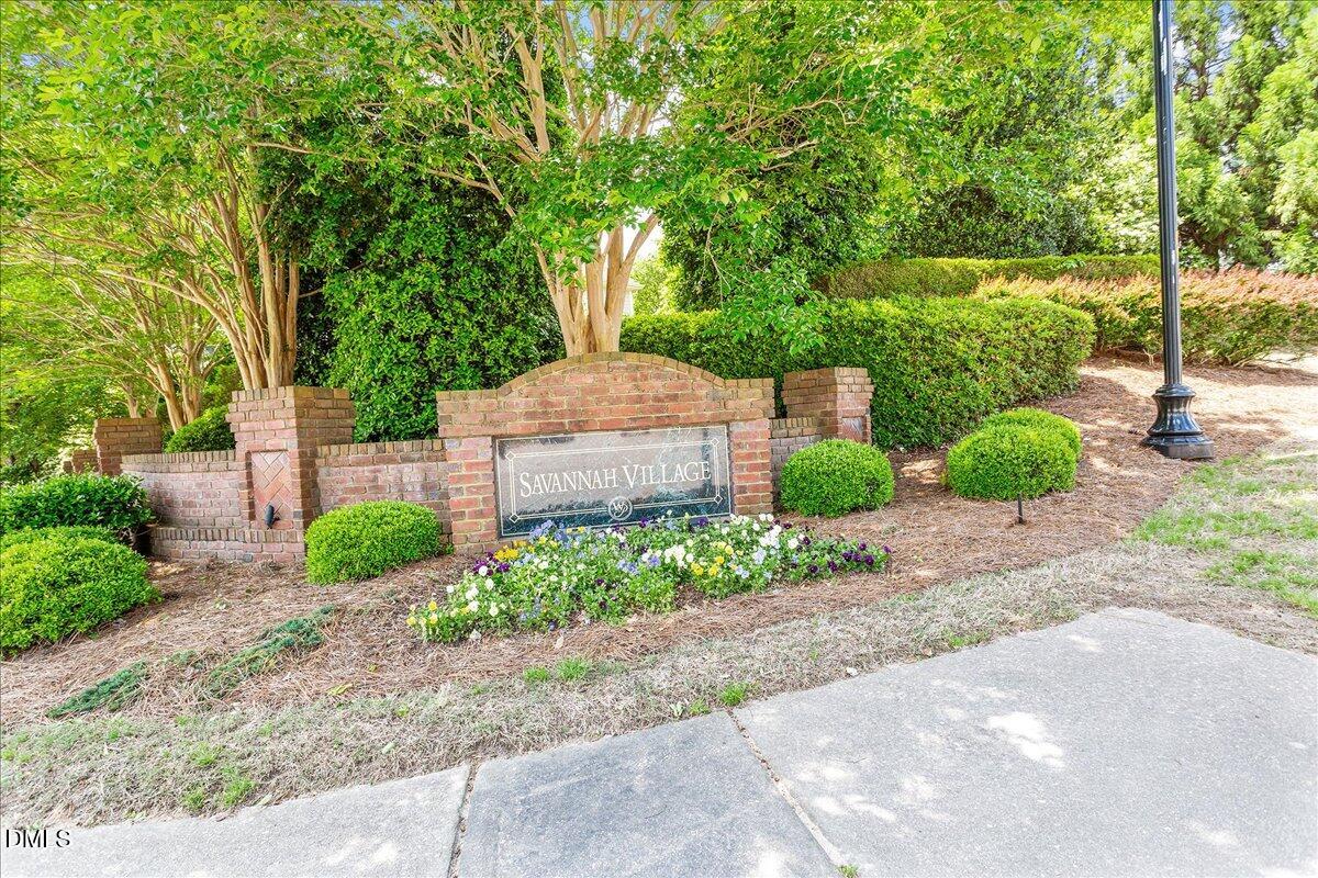 12616 Village Springs Road Raleigh, NC 27614 - Photo 78 of 89 a front view of a house with garden