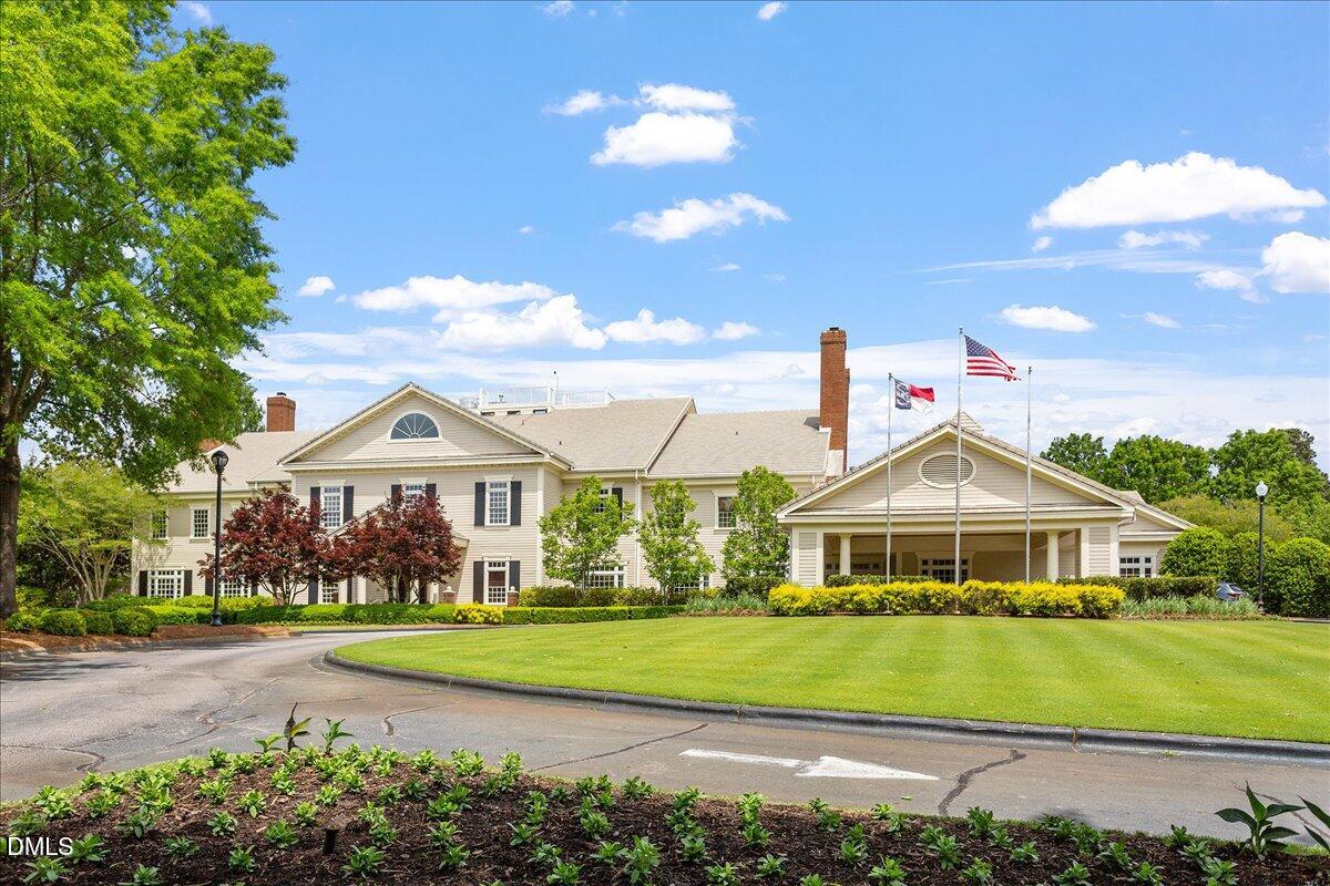 12616 Village Springs Road Raleigh, NC 27614 - Photo 79 of 89 a front view of a house with a yard
