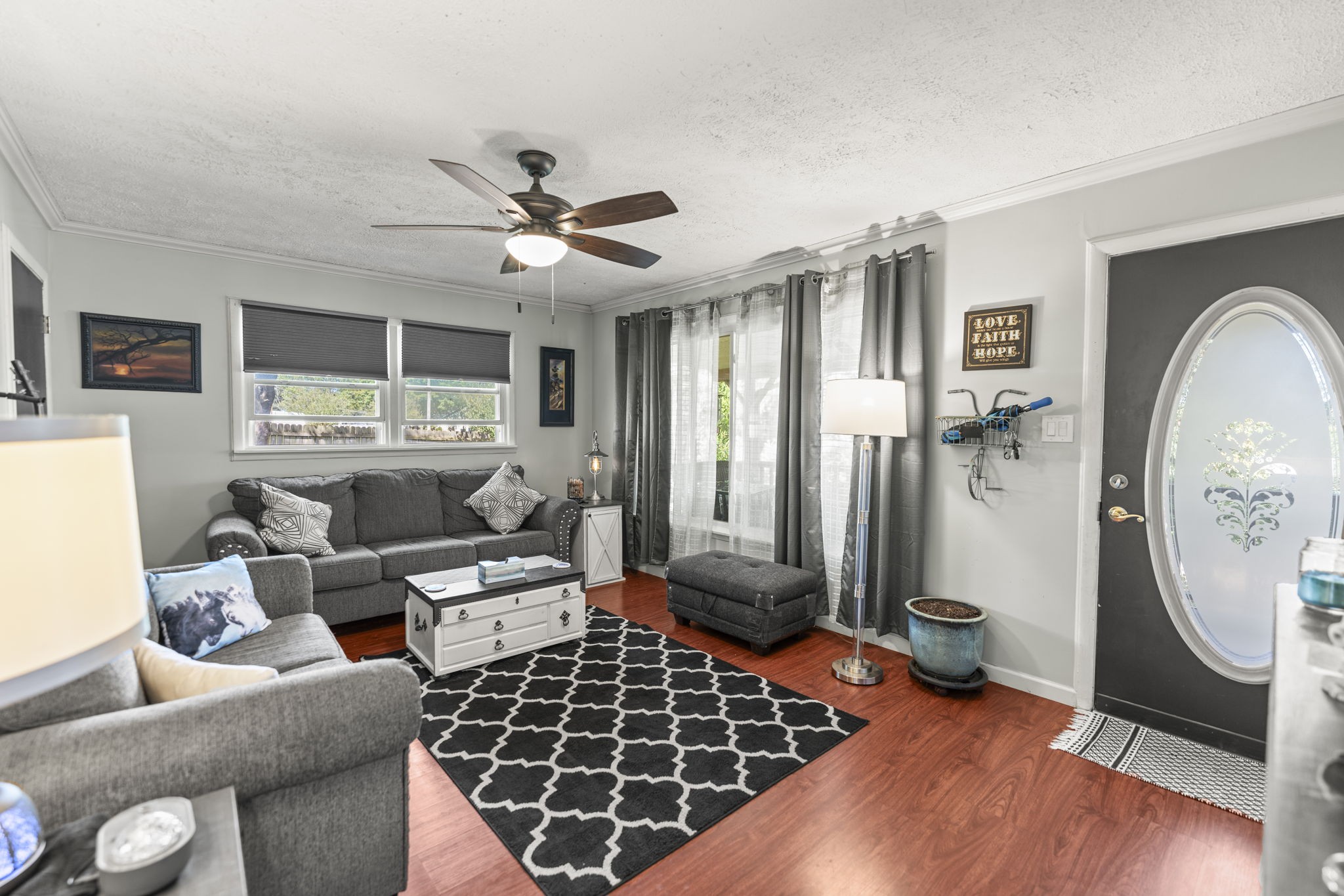 1506 Old Cowan Road Winchester, TN 37398 - Photo 2 of 17 a living room with furniture a window and a chandelier