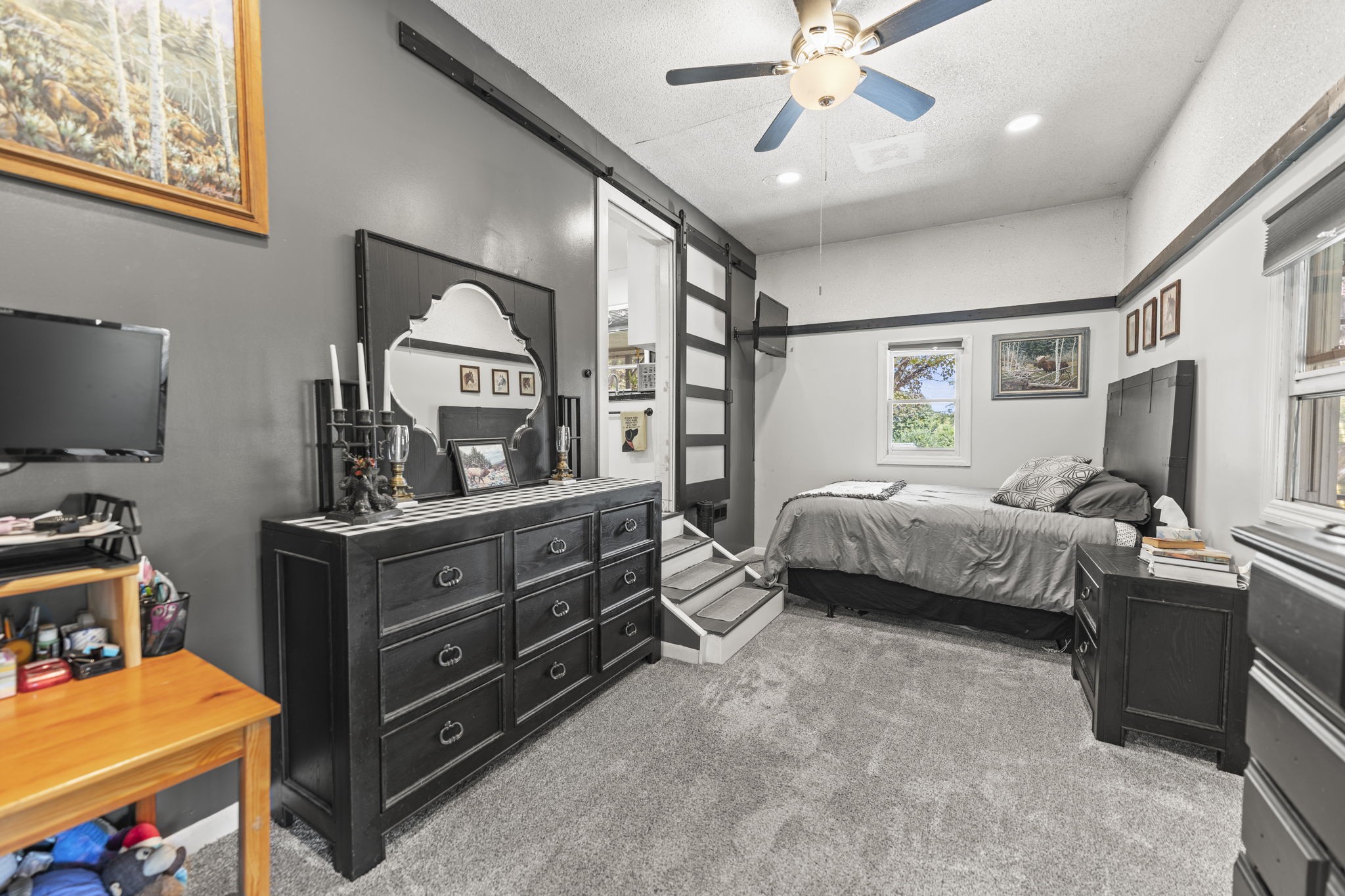1506 Old Cowan Road Winchester, TN 37398 - Photo 6 of 17 a bedroom with a bed and a flat tv screen on dresser