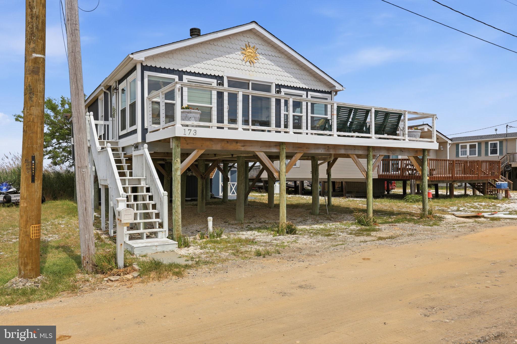 173 Cove Road Newport, NJ 08345 - Photo 40 of 72 a front view of a house with a yard