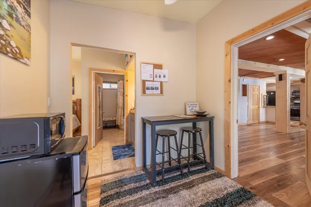 a en suite bathroom with a double vanity sink and a mirror