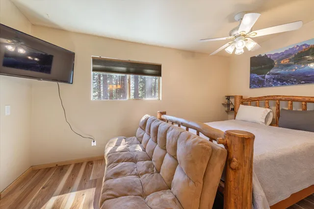 a bathroom with a toilet and a bathtub