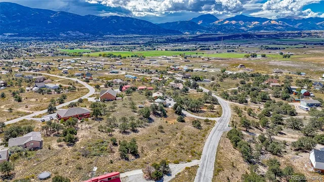 a view of a yard with an empty space and wooden floor