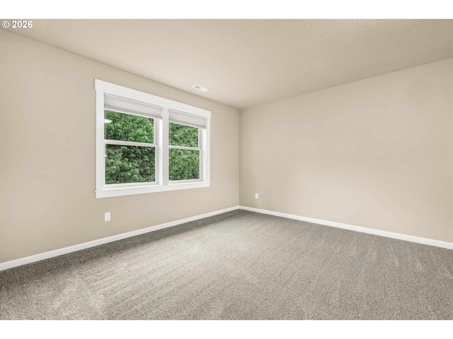 16073 Southeast Pinot Road Milwaukie, OR 97267 - Photo 29 of 44 a view of an empty room with a window