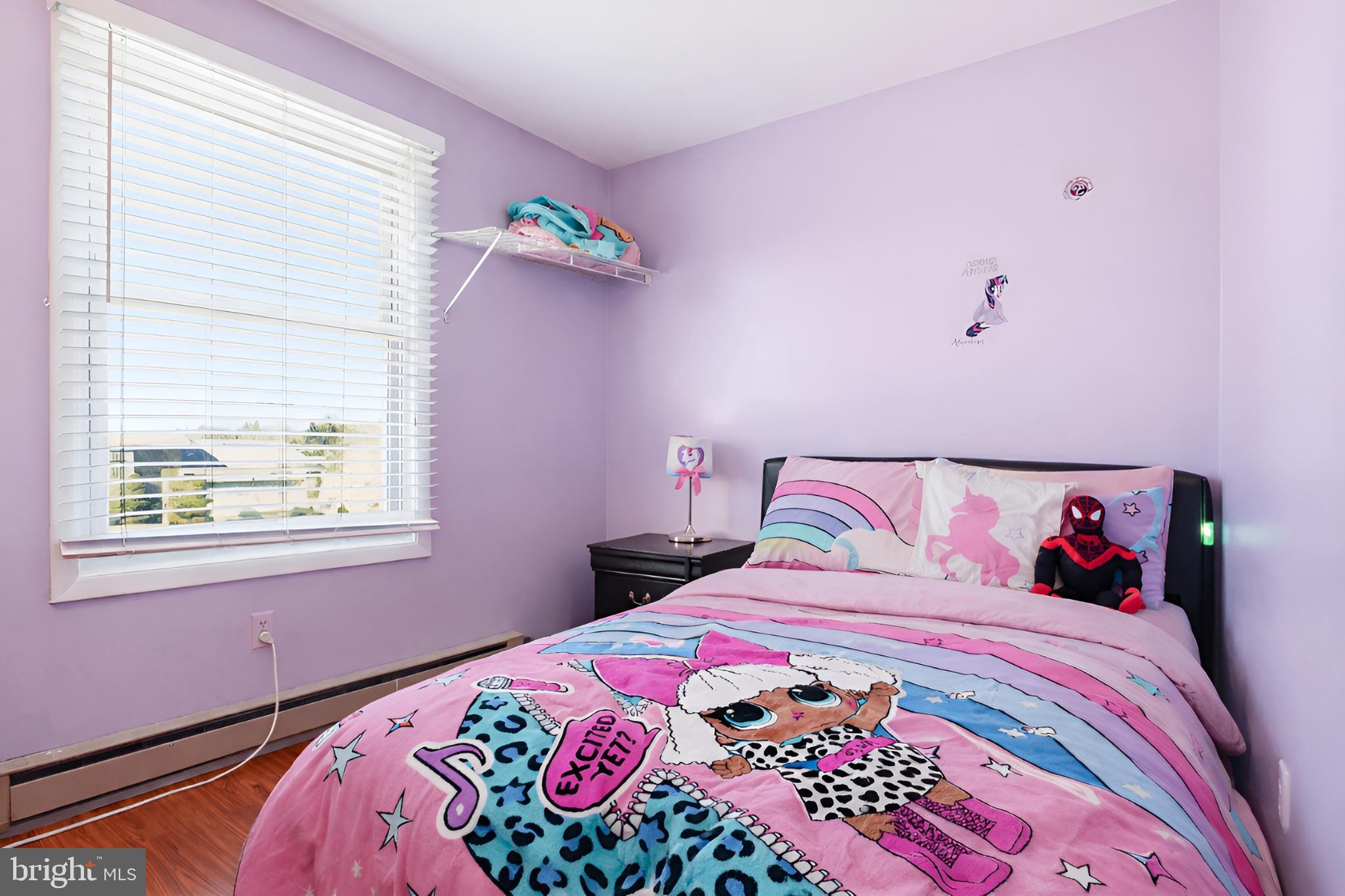 4849 Springtop Drive Harrisburg, PA 17111 - Photo 12 of 42 a bedroom with a bed and a chandelier