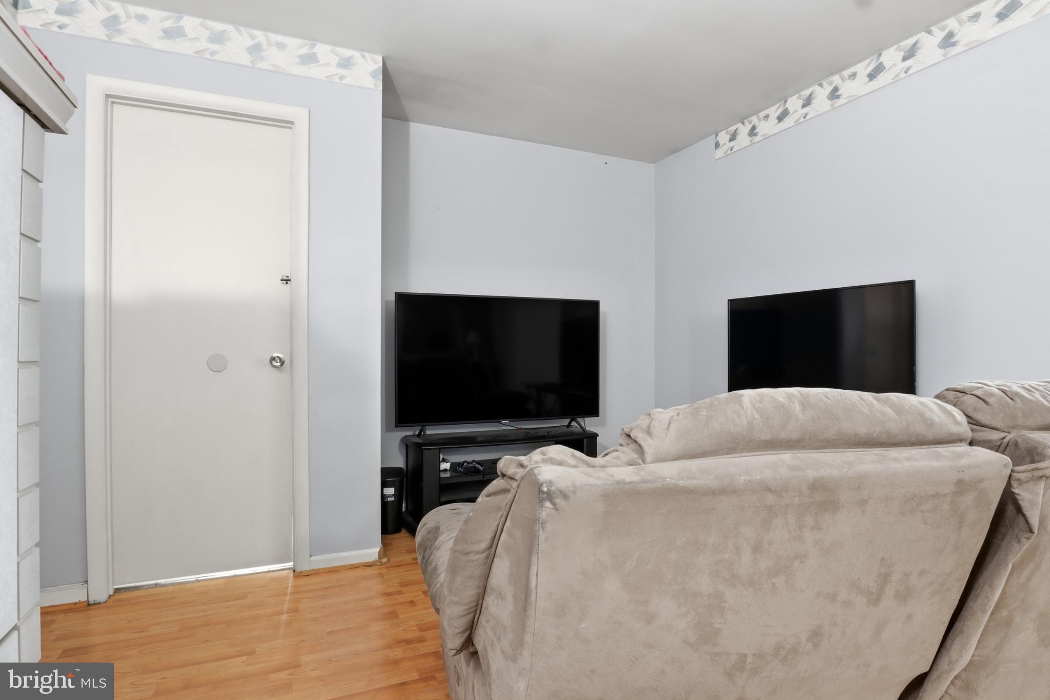 4849 Springtop Drive Harrisburg, PA 17111 - Photo 17 of 42 a bedroom with a bed and a flat screen tv