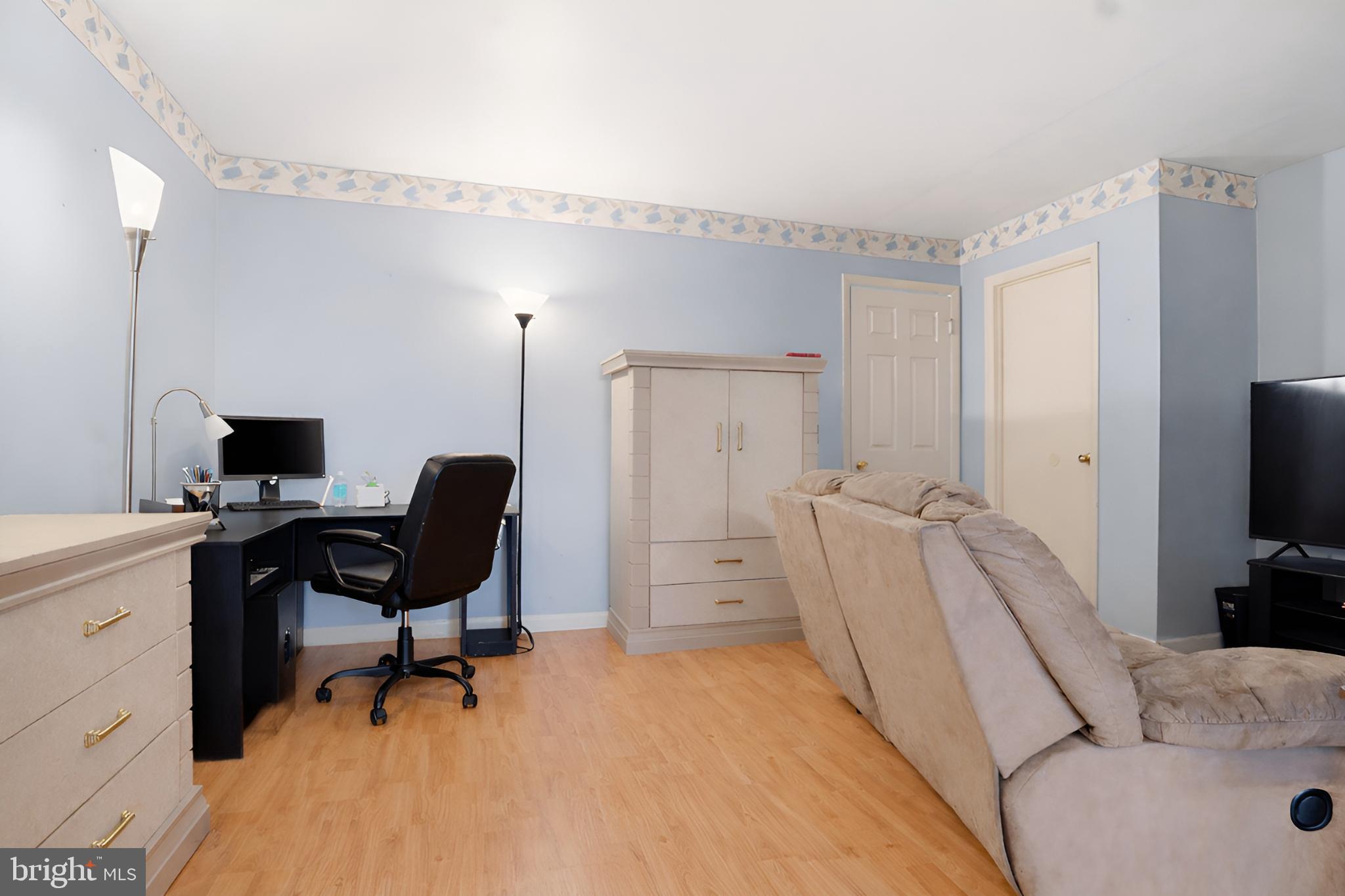 4849 Springtop Drive Harrisburg, PA 17111 - Photo 18 of 42 a view of a workspace with furniture and a window