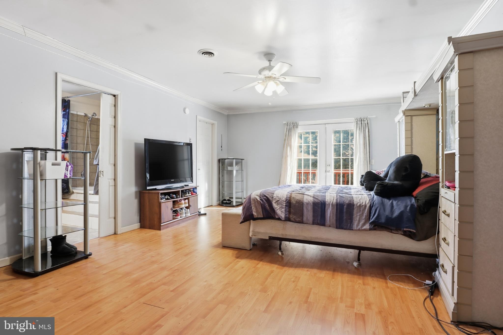 4849 Springtop Drive Harrisburg, PA 17111 - Photo 19 of 42 a living room with furniture and a flat screen tv