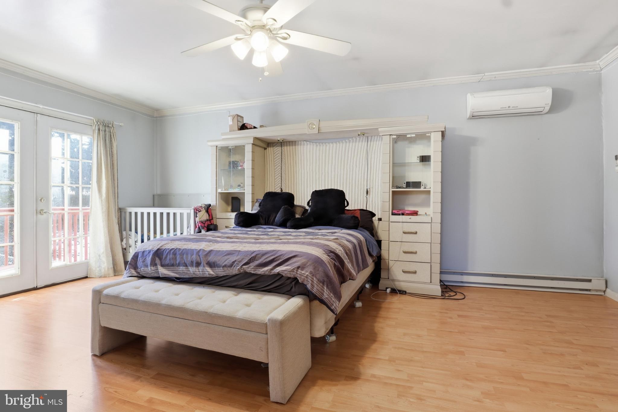 4849 Springtop Drive Harrisburg, PA 17111 - Photo 21 of 42 a bedroom with a bed and window