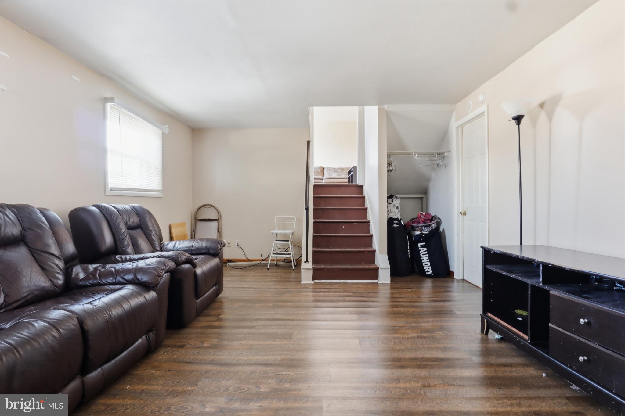 4849 Springtop Drive Harrisburg, PA 17111 - Photo 26 of 42 a living room with furniture and wooden floor