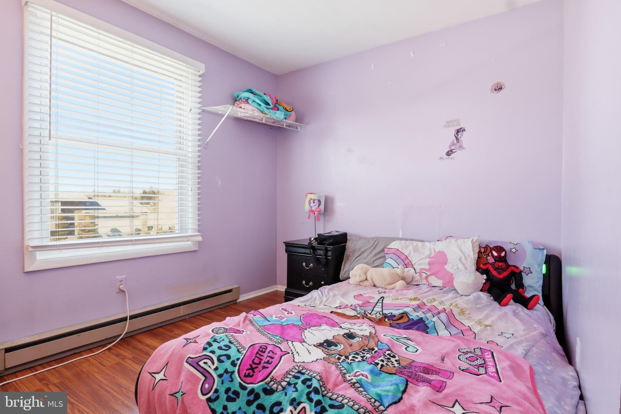 4849 Springtop Drive Harrisburg, PA 17111 - Photo 29 of 42 a bedroom with a bed and a window