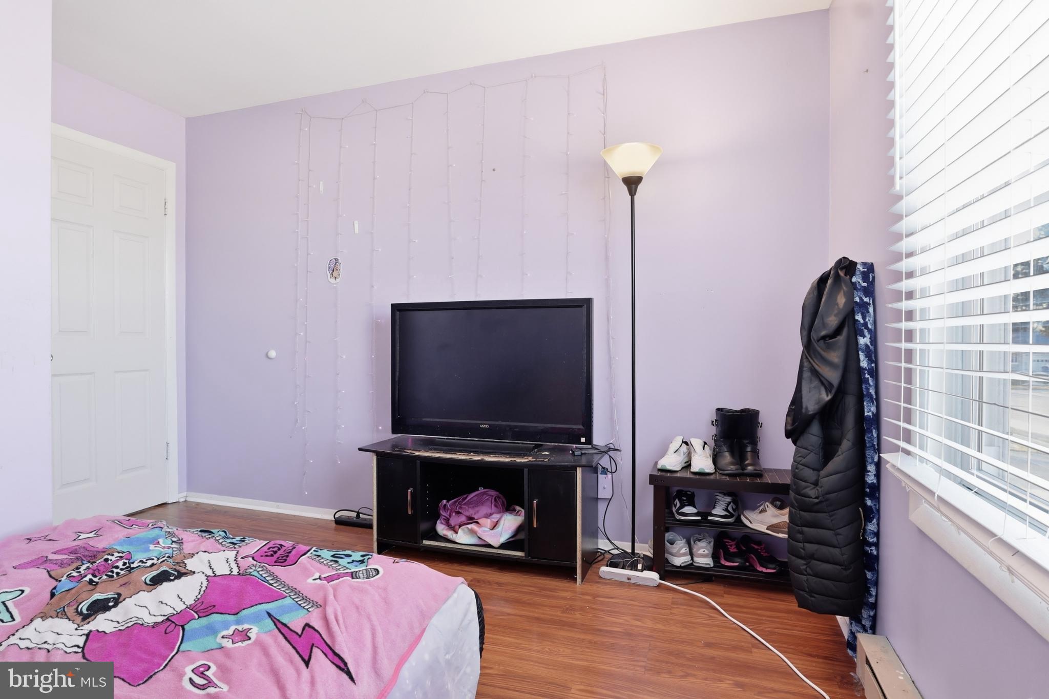 4849 Springtop Drive Harrisburg, PA 17111 - Photo 30 of 42 a bedroom with a bed and a fireplace