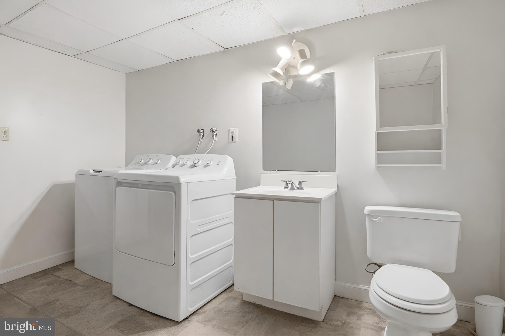 4849 Springtop Drive Harrisburg, PA 17111 - Photo 32 of 42 a utility room with dryer and washer