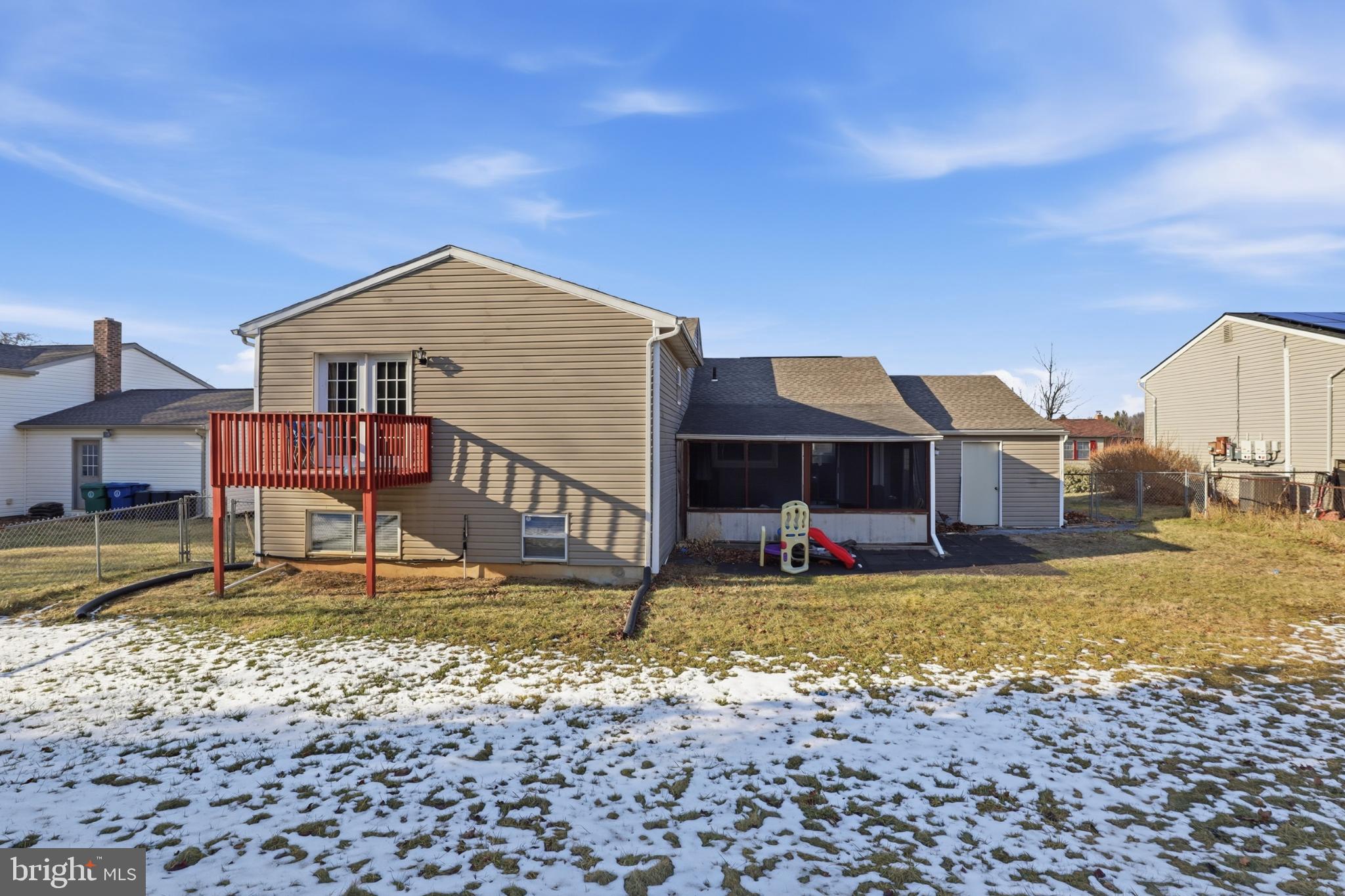 4849 Springtop Drive Harrisburg, PA 17111 - Photo 36 of 42 a house view with a sitting space fire pit and wooden fence