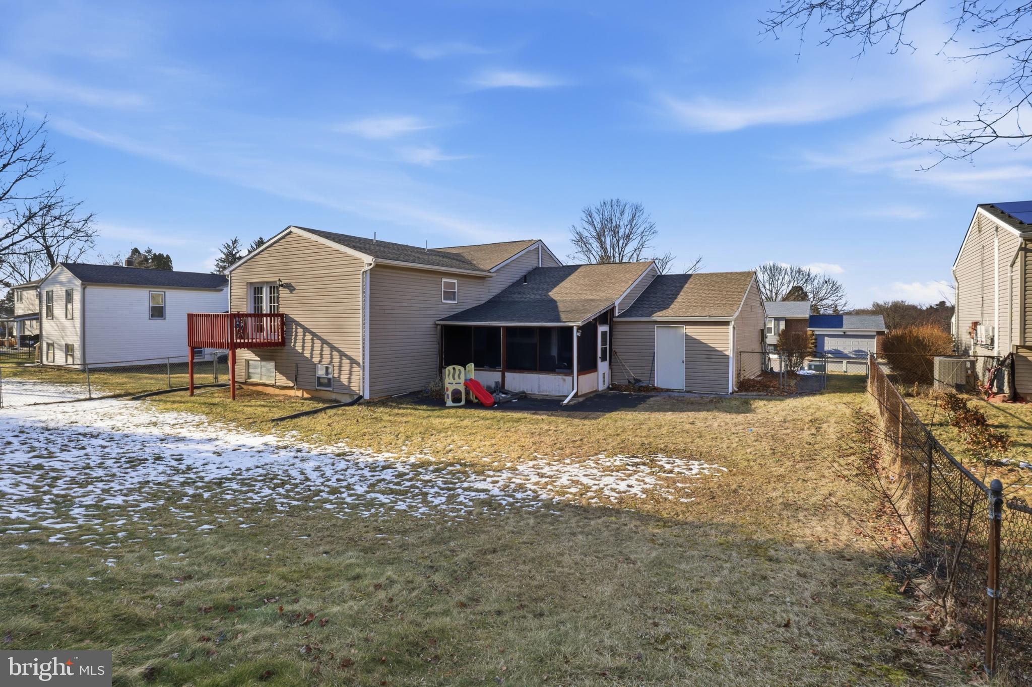 4849 Springtop Drive Harrisburg, PA 17111 - Photo 38 of 42 a view of a house with a big yard and large trees