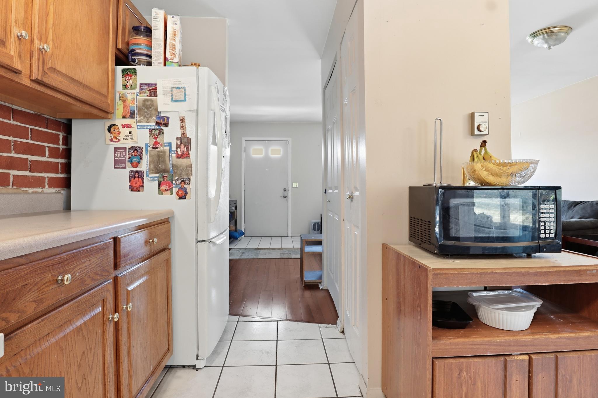 4849 Springtop Drive Harrisburg, PA 17111 - Photo 10 of 42 a kitchen with stainless steel appliances a microwave and cabinets