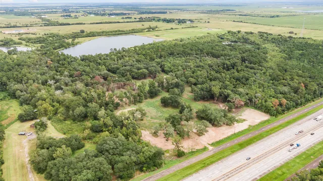 a view of a lake with beach and ocean view