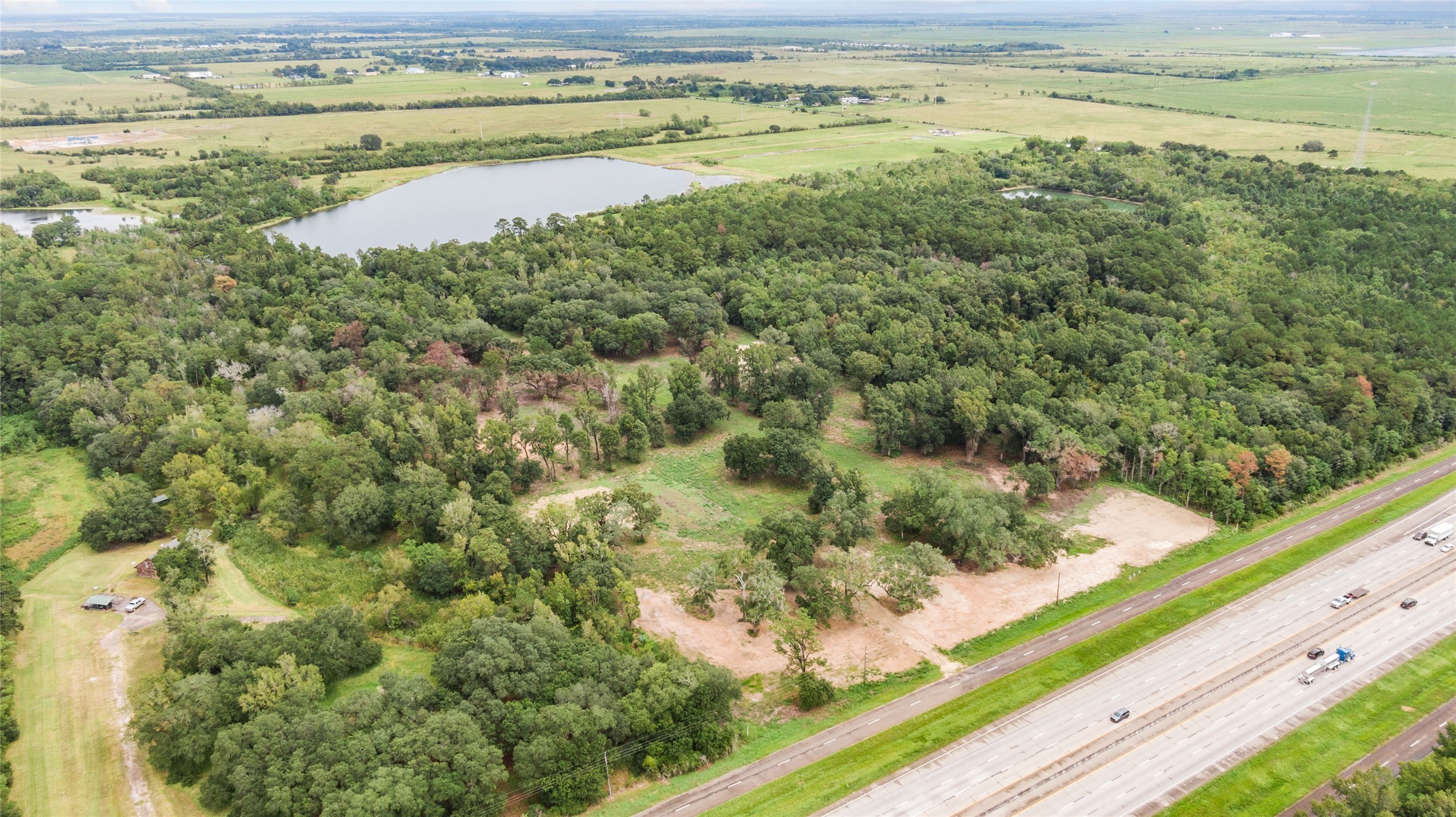 a view of a lake with beach and ocean view