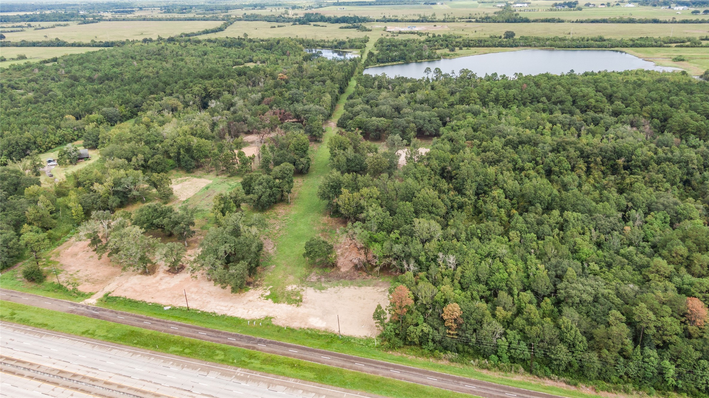 31901 Interstate 10 Hankamer, TX 77560 - Photo 3 of 12 a view of a lake view