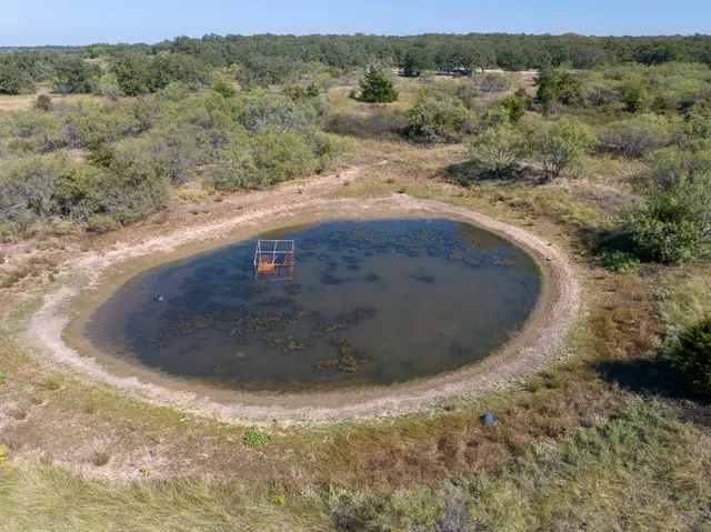 a view of a road with a yard