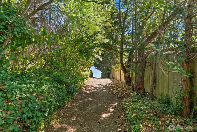 a view of a balcony with chairs and a table