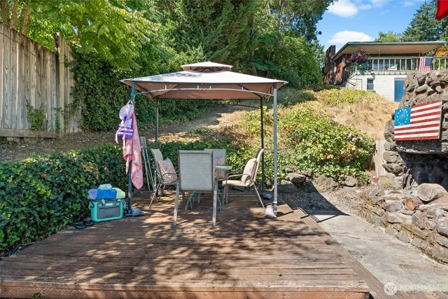 a view of house with lake and mountain view