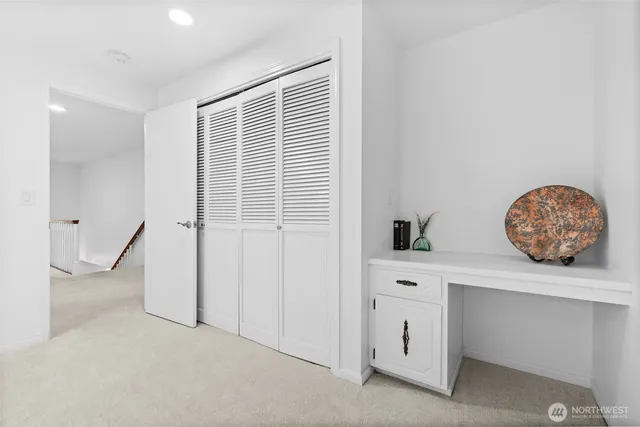 a kitchen with stainless steel appliances granite countertop a sink and cabinets
