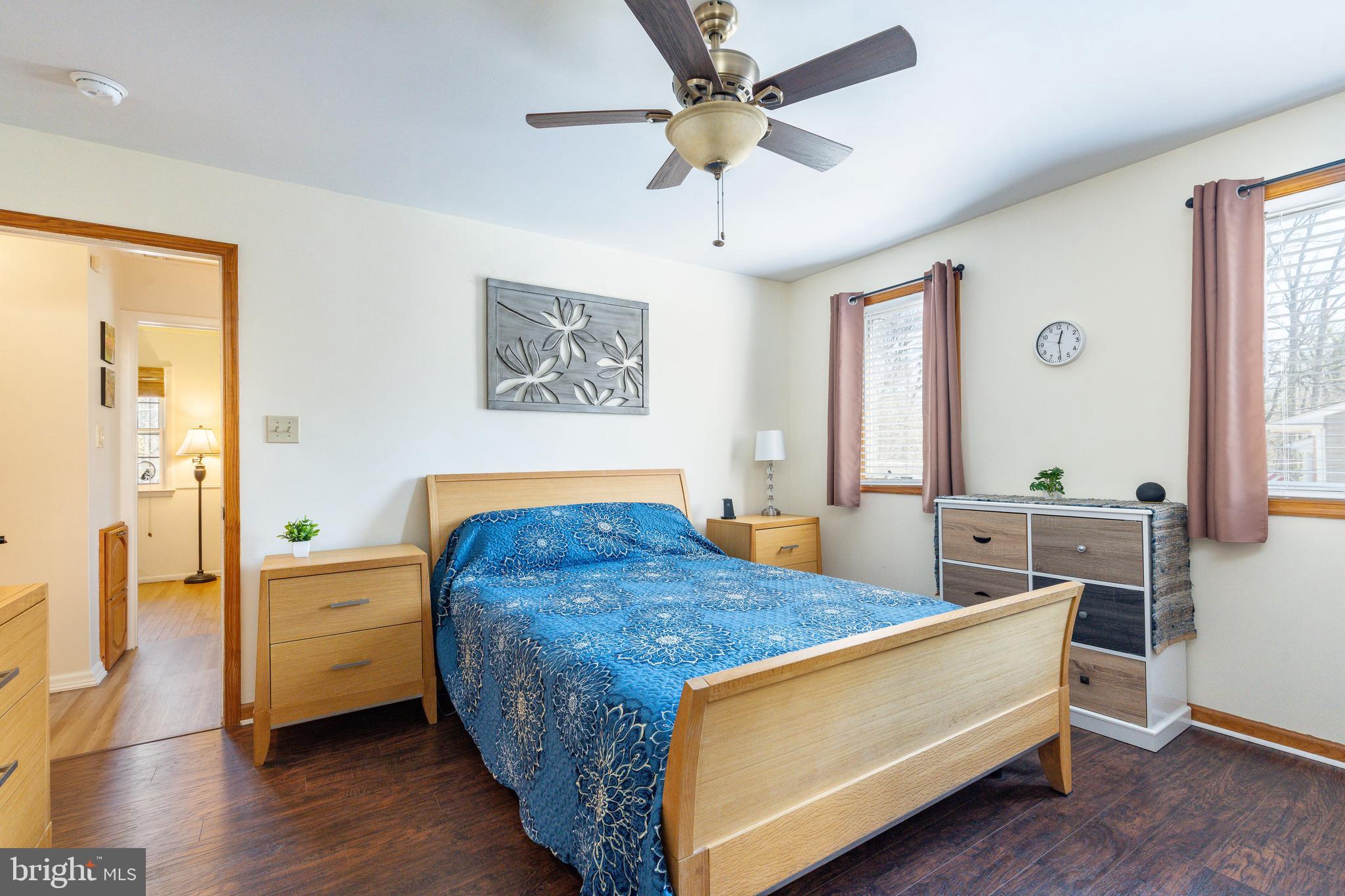 583 Lake Boulevard Lindenwold, NJ 08021 - Photo 22 of 51 a bed room with a bed and a chandelier