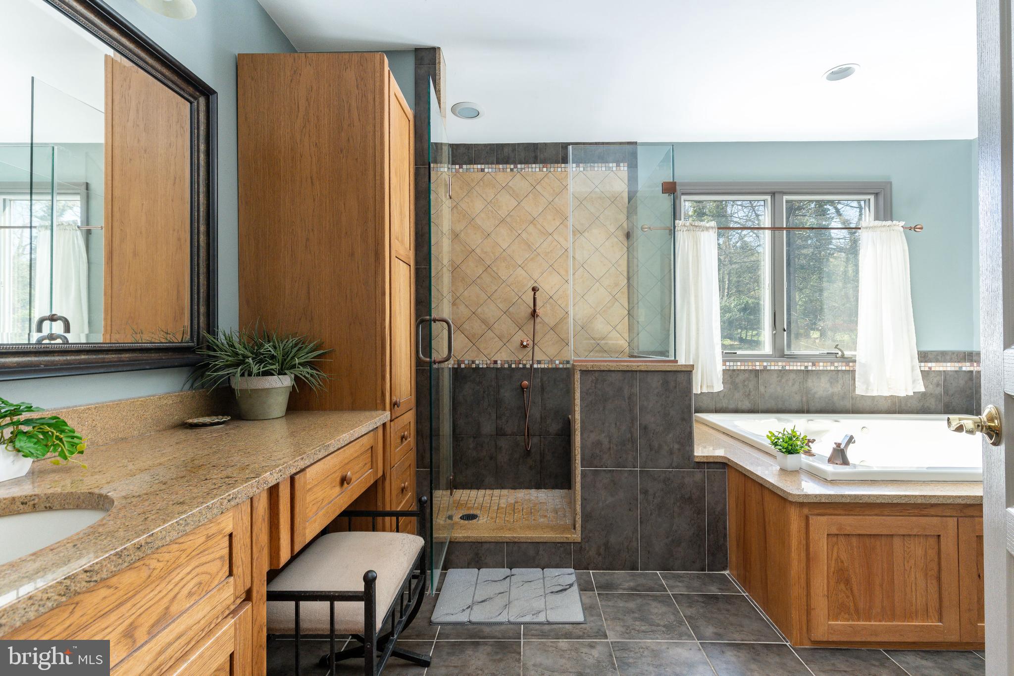 583 Lake Boulevard Lindenwold, NJ 08021 - Photo 23 of 51 a bathroom with a tub shower and sink