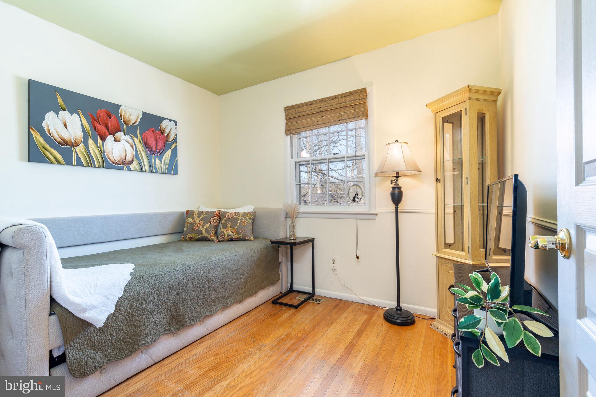 583 Lake Boulevard Lindenwold, NJ 08021 - Photo 30 of 51 a bedroom with a bed and a painting on the wall