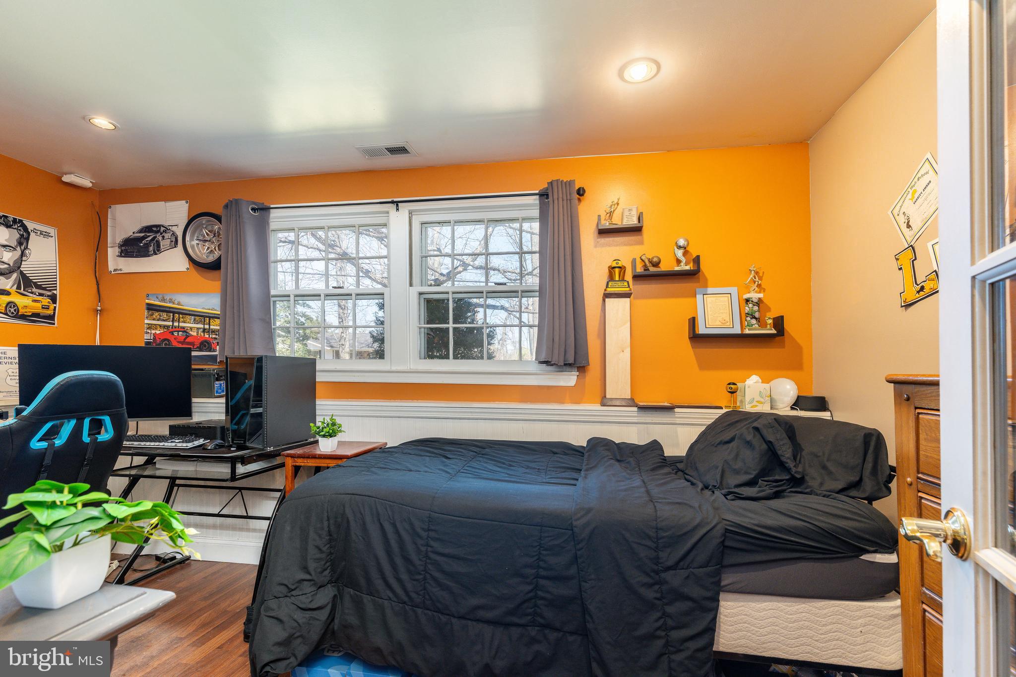 583 Lake Boulevard Lindenwold, NJ 08021 - Photo 35 of 51 a bed sitting in a bedroom next to a window