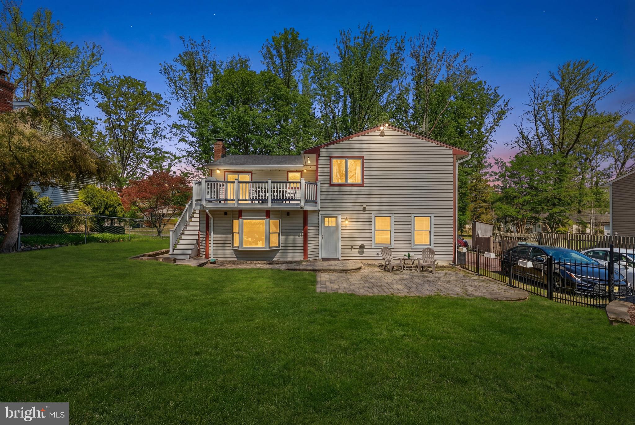 583 Lake Boulevard Lindenwold, NJ 08021 - Photo 45 of 51 a front view of a house with a garden and trees