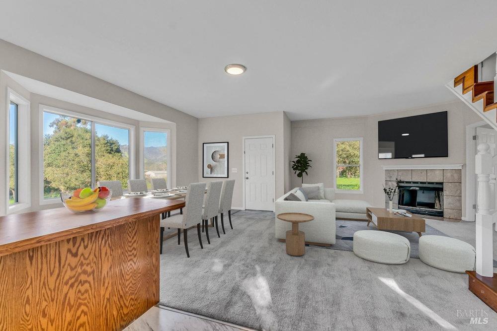 4785 Highway 12 Santa Rosa, CA 95409 - Photo 12 of 80 a living room with fireplace furniture and a large window