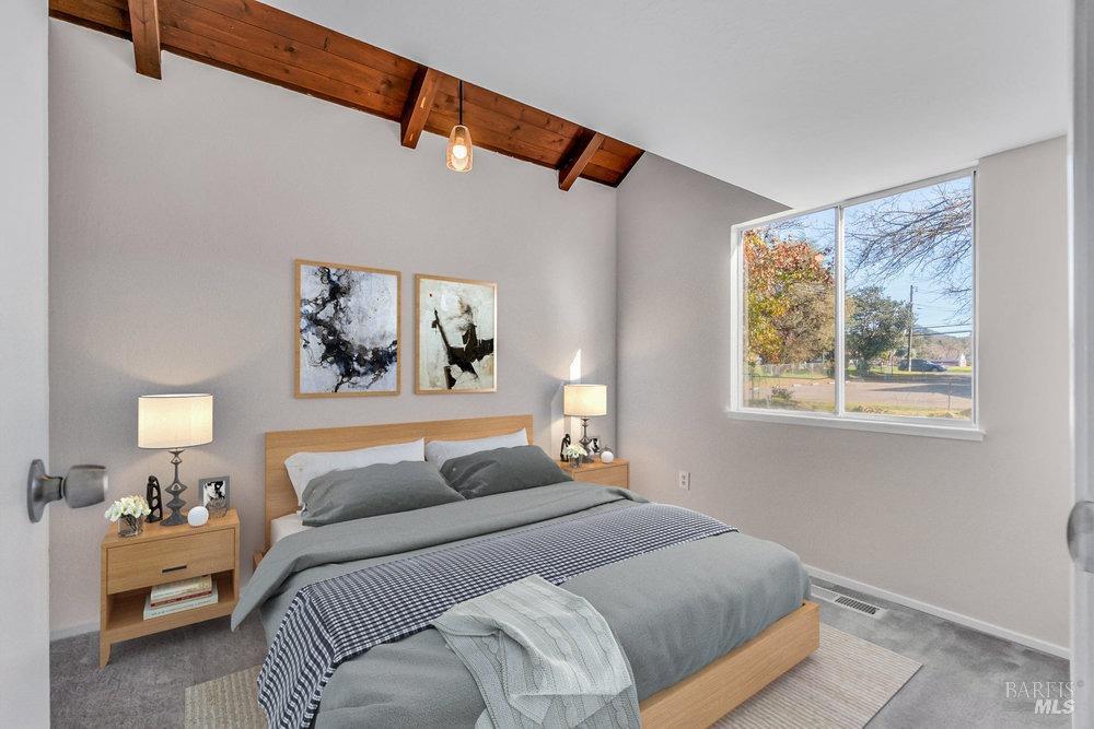 4785 Highway 12 Santa Rosa, CA 95409 - Photo 28 of 80 a bedroom with a bed and a painting on the wall