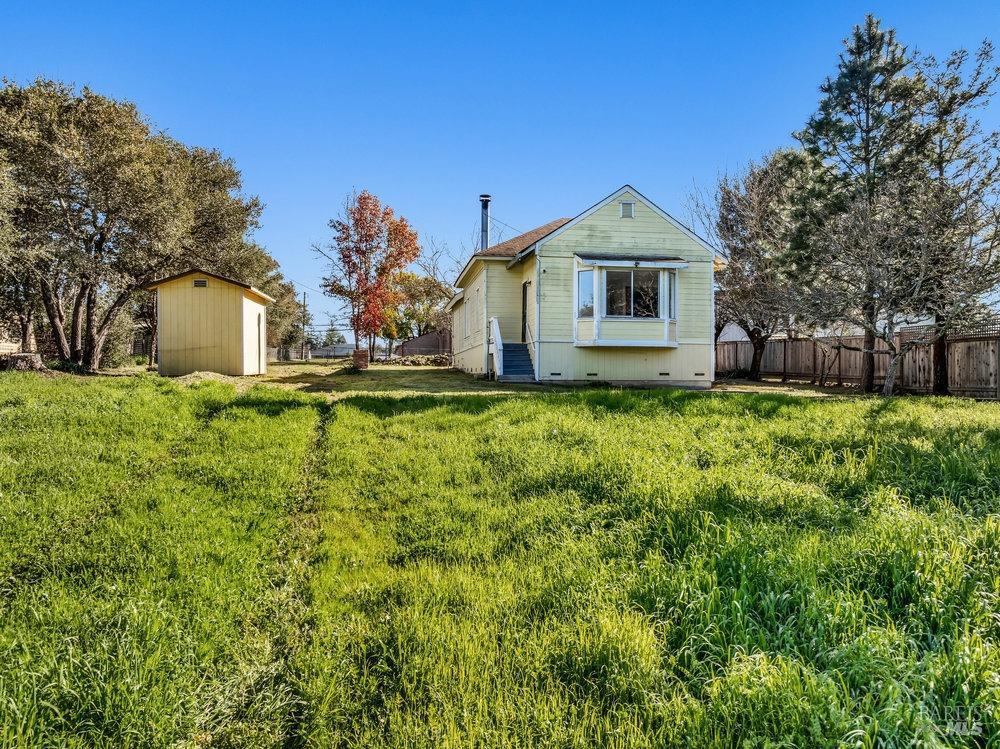 4785 Highway 12 Santa Rosa, CA 95409 - Photo 46 of 80 a large house with a big yard and large trees