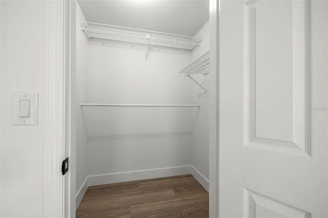 a view of an empty walk in closet