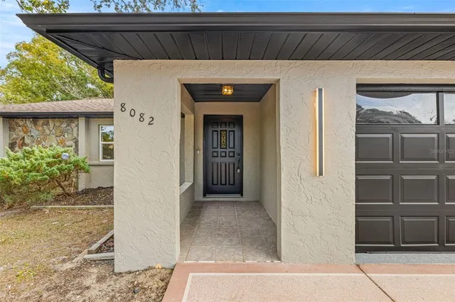 a view of a door and a window