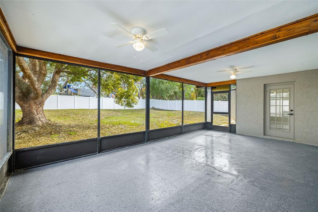 8082 Pagoda Drive Spring Hill, FL 34606 - Photo 24 of 28 a view of an empty room with windows