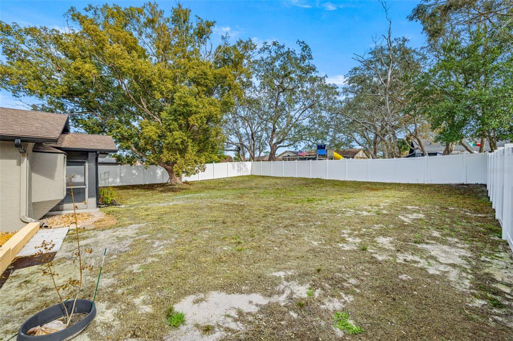 8082 Pagoda Drive Spring Hill, FL 34606 - Photo 25 of 28 a view of an outdoor space and yard