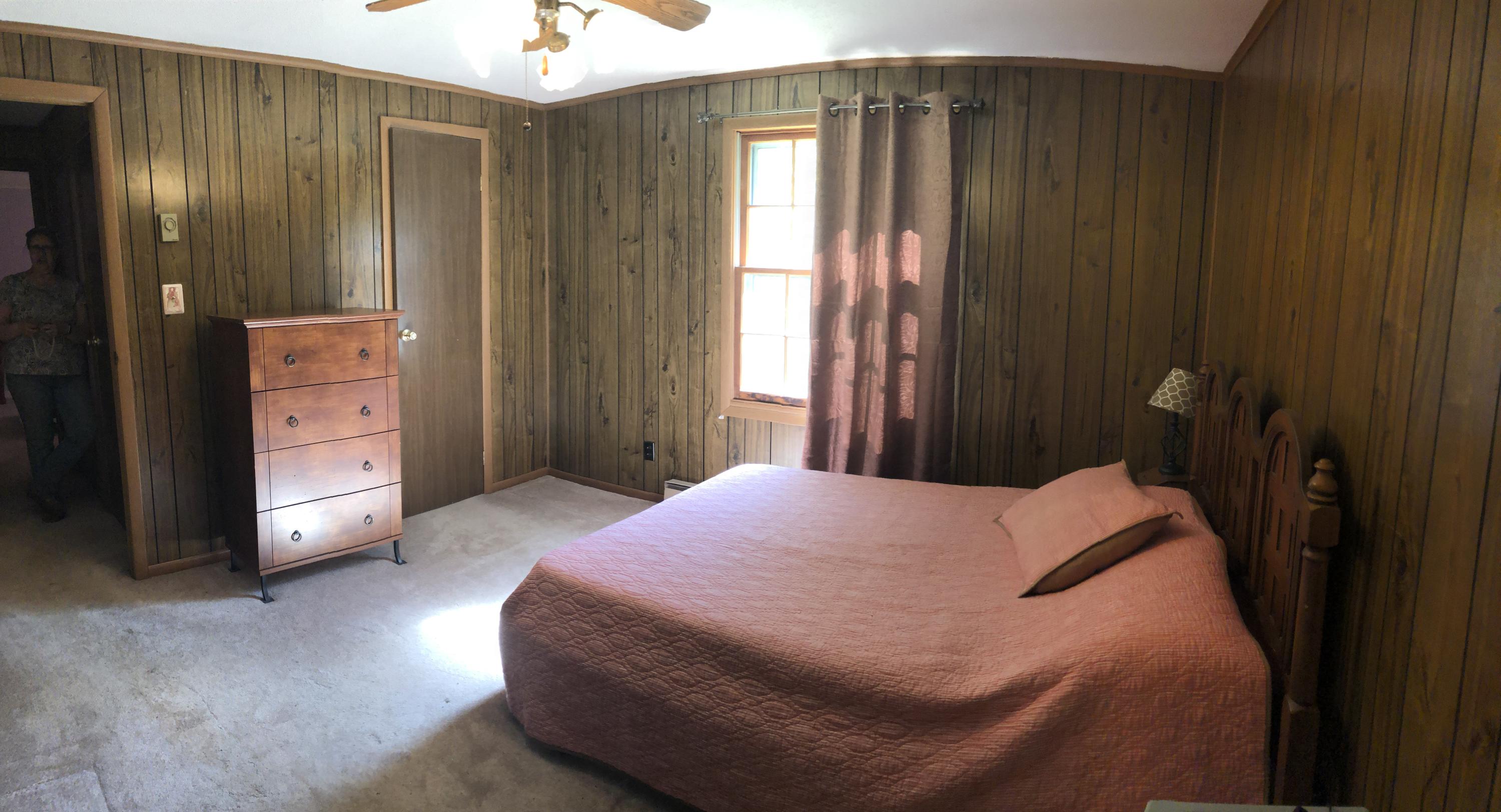 1613 Kings Store Road Northeast Check, VA 24072 - Photo 14 of 25 a bedroom with a bed and a cabinets