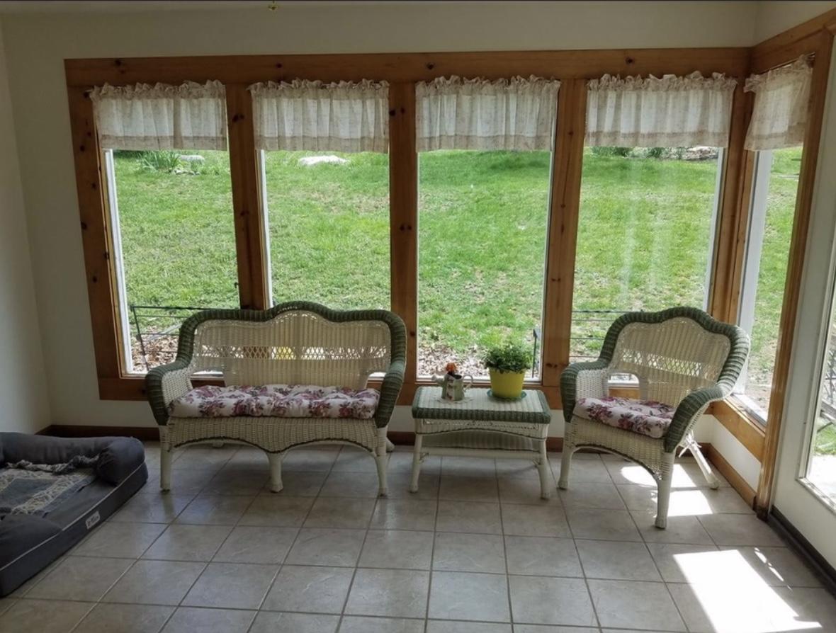 1613 Kings Store Road Northeast Check, VA 24072 - Photo 8 of 25 a living room with furniture and a floor to ceiling window